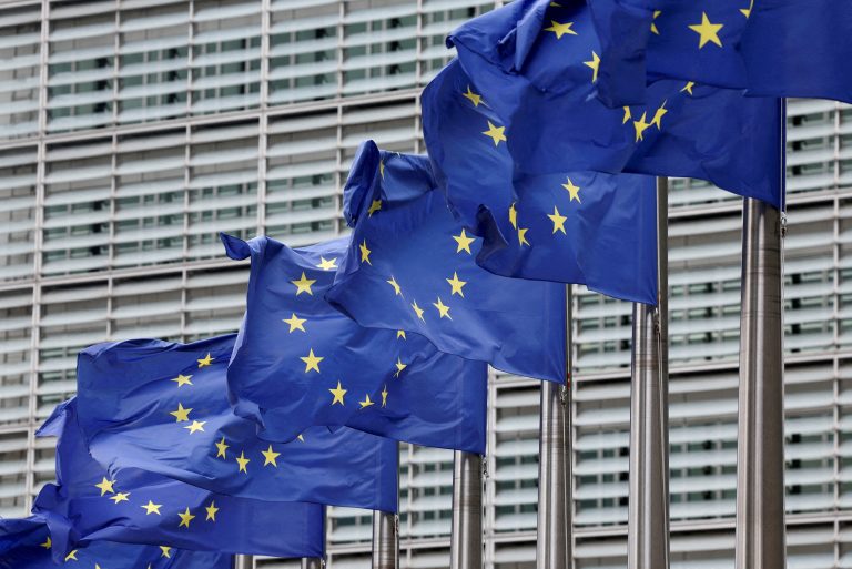 European Union flags flutter outside the EU Commission headquarters in Brussels